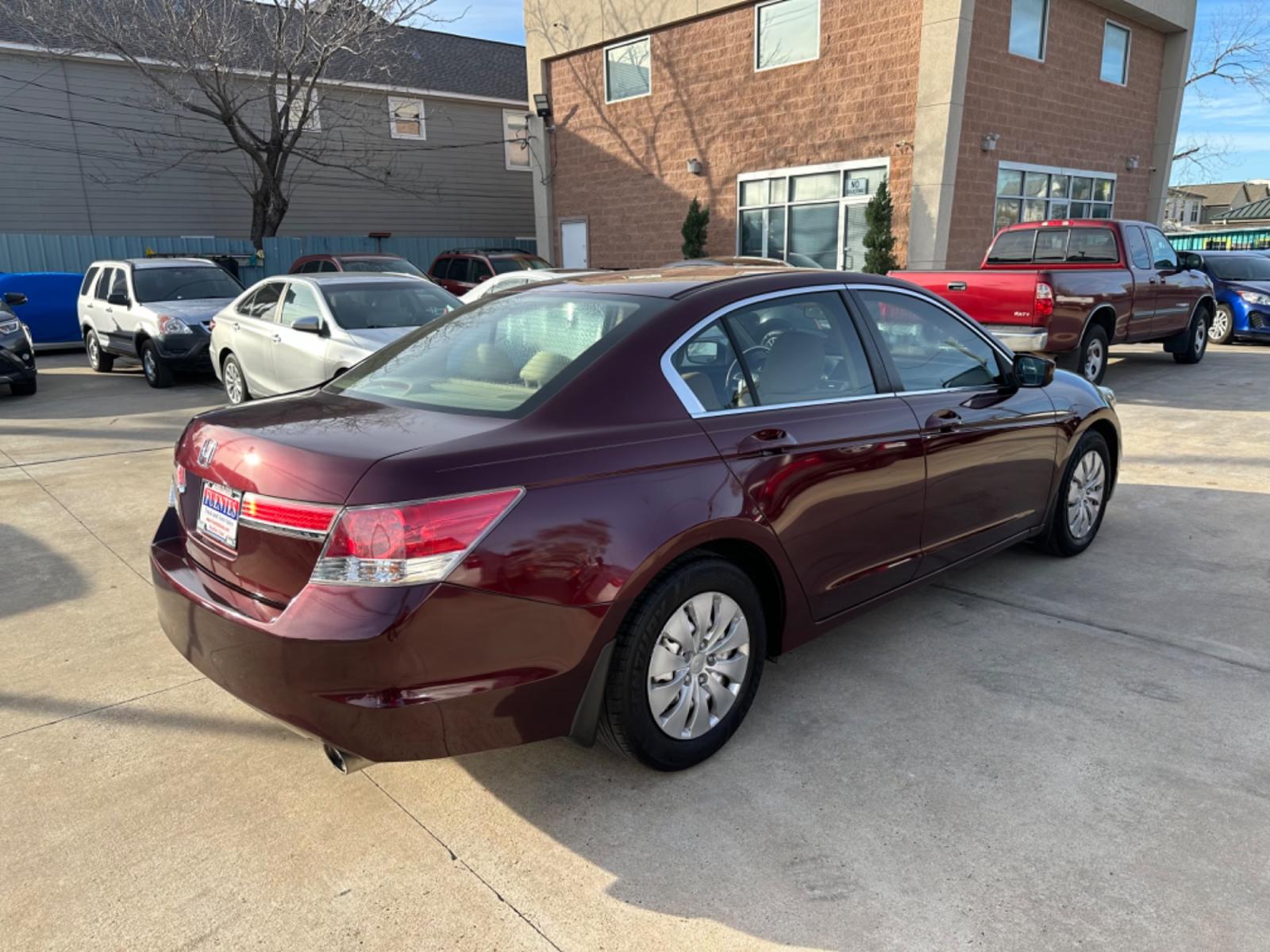 2012 Maroon /Beige Honda Accord LX (1HGCP2F33CA) with an 2.4L engine, Automatic transmission, located at 1501 West 15th St., Houston, 77008, (713) 869-2925, 29.797941, -95.411789 - Photo #2